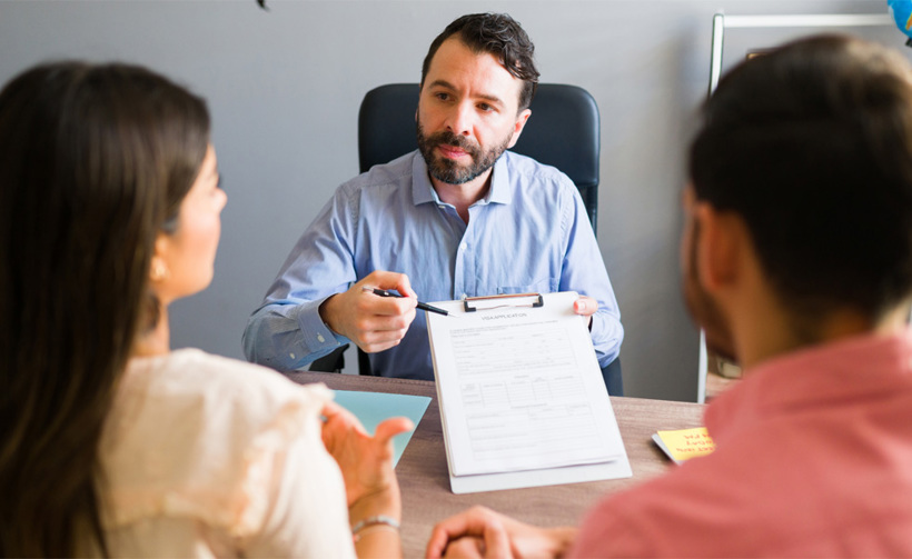 Couple reviewing contract